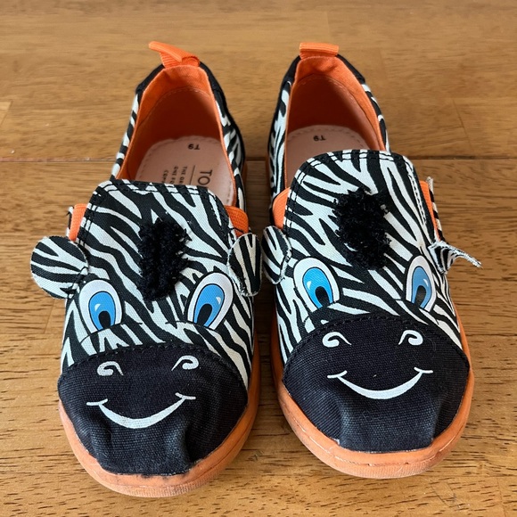Toms Zebra Print Kids Slippers with Orange and Blue Accents - Picture 1 of 5